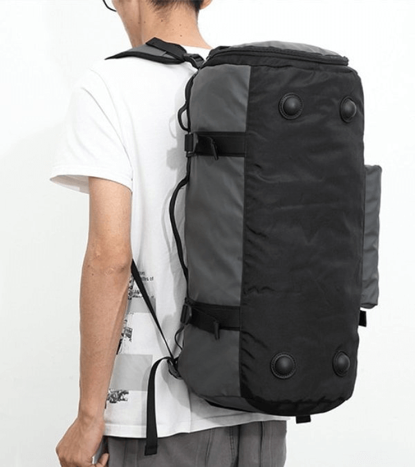 Unisex waterproof sports bag worn on back, black with side pockets and shoe compartment, ideal for training and travel, model SF0920